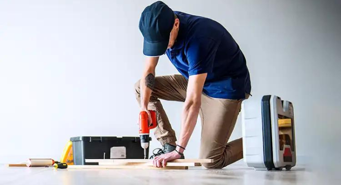handyman Dubai UAE home repair TV mounting curtains